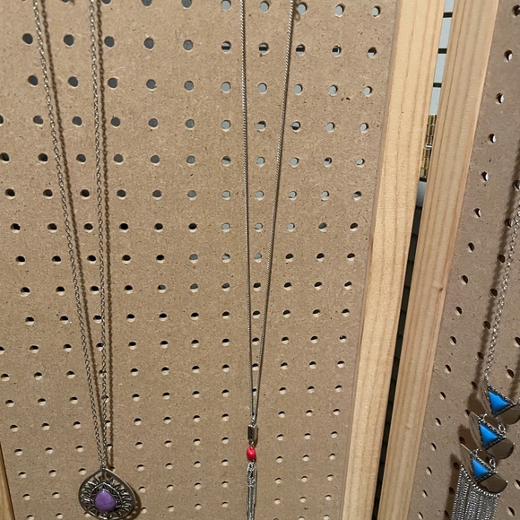 Long silver necklace with a silver triangle, red crackle, and fringe. - Picture 5 of 5